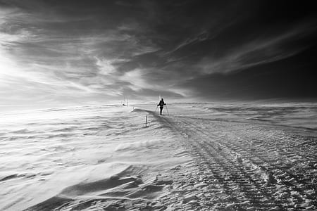 person walking in snowy area thumbnail