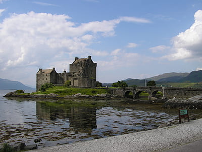 gray concrete castle near body of water thumbnail