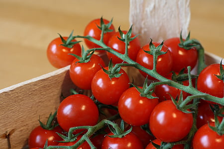 bunch of cherry tomatoes on brown container thumbnail