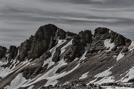 brown mountain covered with snow thumbnail