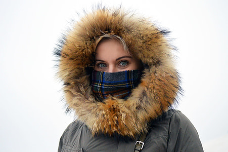 woman in black and brown parka during daytime thumbnail