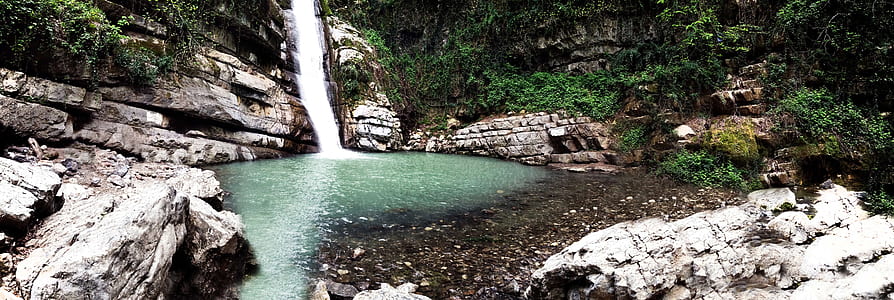 Waterfalls Surrounded by Green Plants thumbnail