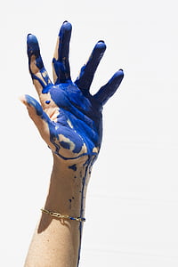 person wearing gold-colored bracelet thumbnail