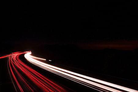 timelapse photography of cars at nighttime thumbnail