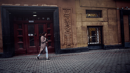 person walking past door thumbnail