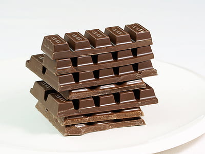 selective focus photography of chocolate bar on white plate thumbnail