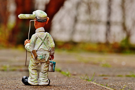 male painter figurine on ground thumbnail