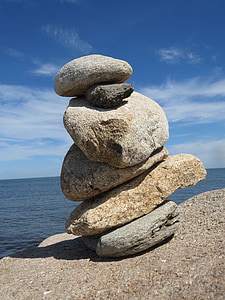 stack of stone near beach thumbnail