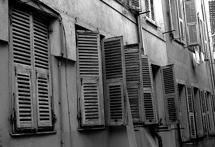 grayscale photography of open windows thumbnail