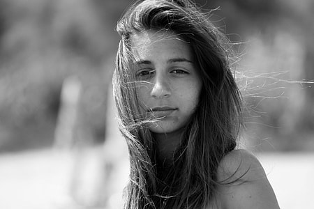 selective focus photo of woman's face thumbnail