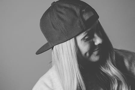 woman in black cap thumbnail