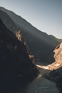 spring river between mountain photography thumbnail