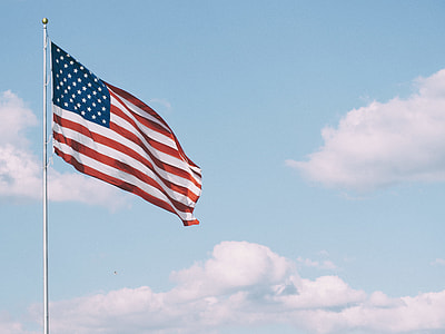 American Flag on flag pole during day time thumbnail