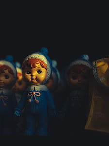 selective focus photography of figurines thumbnail