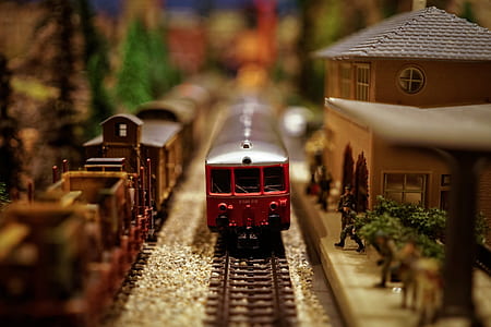 shallow focus photography of red plastic train toy thumbnail