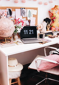 gray laptop computer on top of desk thumbnail