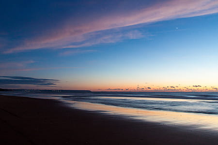 Time Lapse Photo of Seashore during Golden Hour thumbnail
