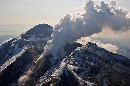 Crater with steam of redoubt Volcano in Lake Clark National Park, Alaska thumbnail