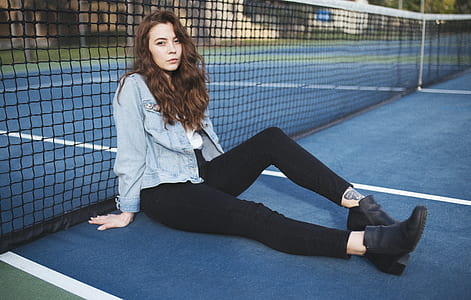 woman in blue denim jacket sitting in floor thumbnail