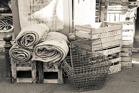 grayscale photography of baskets, crates, and covers thumbnail