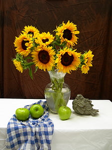 sunflowers in clear glass vase thumbnail