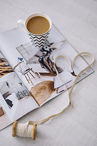 Coffee with home decor magazines thumbnail