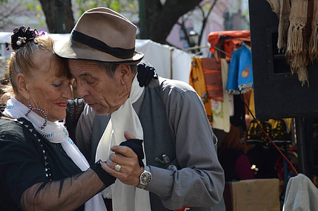 woman and man dancing during daytime thumbnail