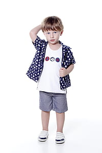 standing boy holding his head thumbnail
