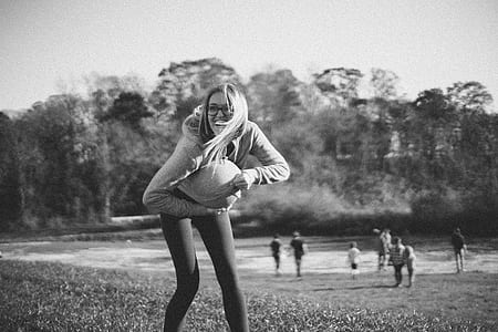 grayscale of woman on beach thumbnail