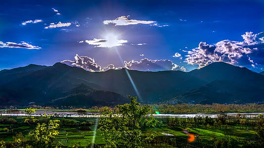 Sunlight Passing Through Grey Clouds thumbnail