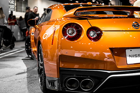 shallow focus photography of orange Nissan GTR R35 thumbnail
