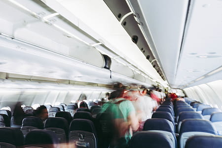 people walking in airplane thumbnail