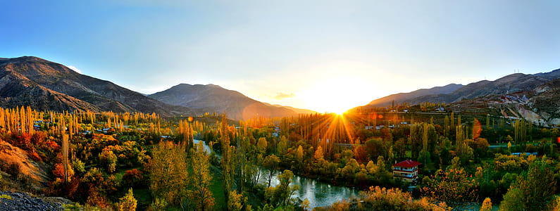 sunrise at forest between mountains high ground photography thumbnail