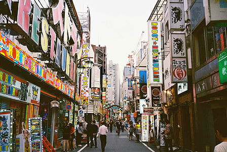 street between assorted-color buildings thumbnail