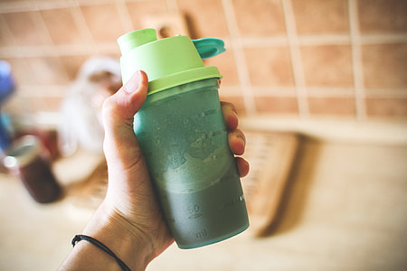 Man Holding Fitness Gainer/Protein Shake thumbnail