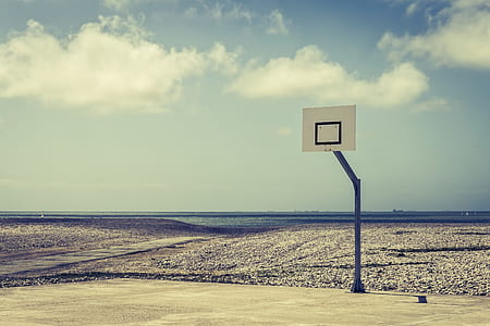 white and black basketball hoop at daytime thumbnail