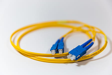 selective focus photography of yellow coated wire thumbnail