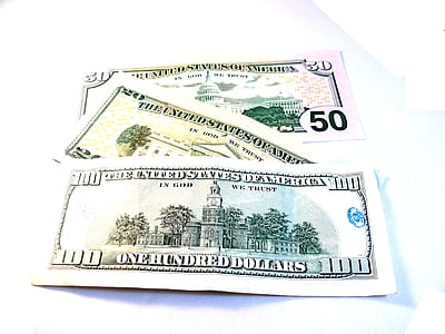 three assorted-denomination US dollar banknotes thumbnail