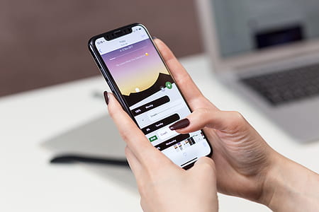 person wearing space gray iPhone X thumbnail