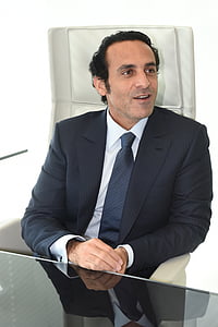man in black suit jacket thumbnail