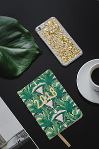 Top view of black table with 2018 calendar agenda thumbnail