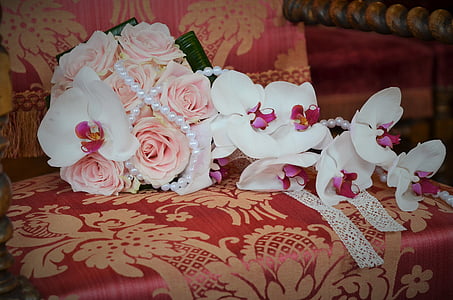 bouquet of pink roses on top of armchair thumbnail