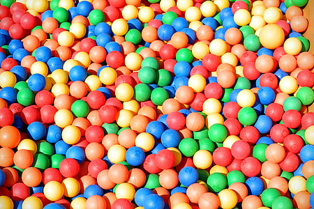 fill the frame photography of assorted-color plastic ball toys thumbnail