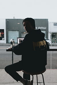 man sitting on chair thumbnail