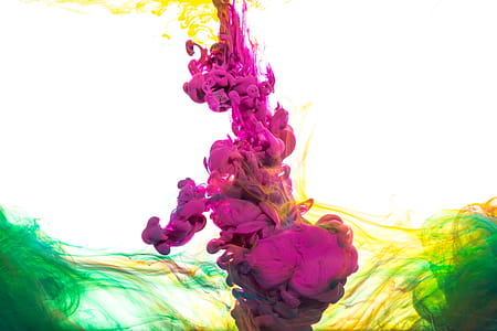 Purple Ink Into Green And Yellow Photo thumbnail