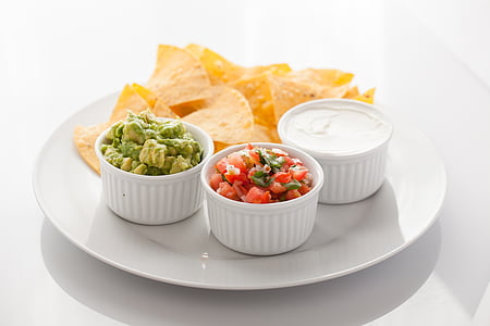 three ramekins with dip and chips thumbnail