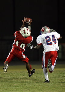two football players on football field thumbnail