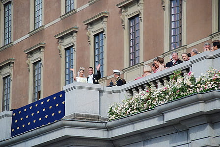 people standing on balcony at daytime thumbnail