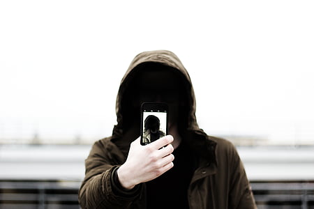 man wearing brown hoodie photography thumbnail
