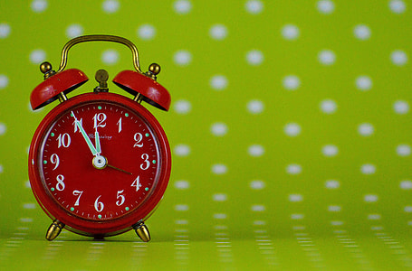 red analog alarm clock thumbnail